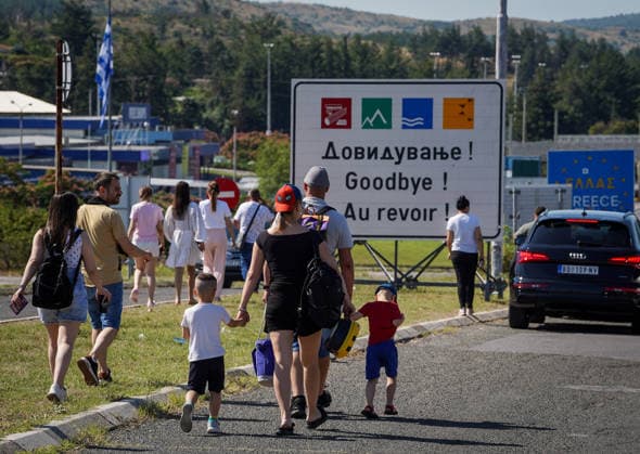 Schengen Entry Exit System North Macedonia and Greece border GEVGELIJA, NORTH MACEDONIA - JUNE 20: A view of the kilometer-long queues of vehicles heading toward Greece at the Evzoni border crossing in Gevgelija, North Macedonia on June 20, 2026. Travelers face hours-long delays amid heavy summer traffic and the implementation of the new Schengen Entry Exit System (EES), which requires the collection of biometric data from passengers. Nake Batev Anadolu Gevgelija North Macedonia. Editorial use only. Please get in touch for any other usage.  Copyright: x2026xAnadoluxNakexBatevx