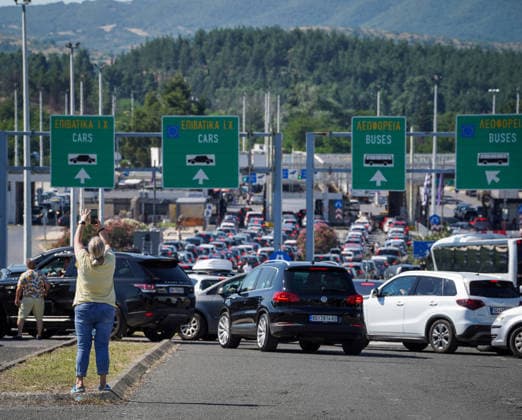 Schengen Entry Exit System North Macedonia and Greece border GEVGELIJA, NORTH MACEDONIA - JUNE 20: A view of the kilometer-long queues of vehicles heading toward Greece at the Evzoni border crossing in Gevgelija, North Macedonia on June 20, 2026. Travelers face hours-long delays amid heavy summer traffic and the implementation of the new Schengen Entry Exit System (EES), which requires the collection of biometric data from passengers. Nake Batev Anadolu Gevgelija North Macedonia. Editorial use only. Please get in touch for any other usage.  Copyright: x2026xAnadoluxNakexBatevx