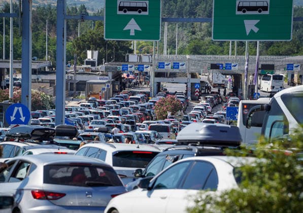 Schengen Entry Exit System North Macedonia and Greece border GEVGELIJA, NORTH MACEDONIA - JUNE 20: A view of the kilometer-long queues of vehicles heading toward Greece at the Evzoni border crossing in Gevgelija, North Macedonia on June 20, 2026. Travelers face hours-long delays amid heavy summer traffic and the implementation of the new Schengen Entry Exit System (EES), which requires the collection of biometric data from passengers. Nake Batev Anadolu Gevgelija North Macedonia. Editorial use only. Please get in touch for any other usage.  Copyright: x2026xAnadoluxNakexBatevx
