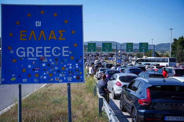 Schengen Entry Exit System North Macedonia and Greece border GEVGELIJA, NORTH MACEDONIA - JUNE 20: A view of the kilometer-long queues of vehicles heading toward Greece at the Evzoni border crossing in Gevgelija, North Macedonia on June 20, 2026. Travelers face hours-long delays amid heavy summer traffic and the implementation of the new Schengen Entry Exit System (EES), which requires the collection of biometric data from passengers. Nake Batev Anadolu Gevgelija North Macedonia. Editorial use only. Please get in touch for any other usage.  Copyright: x2026xAnadoluxNakexBatevx
