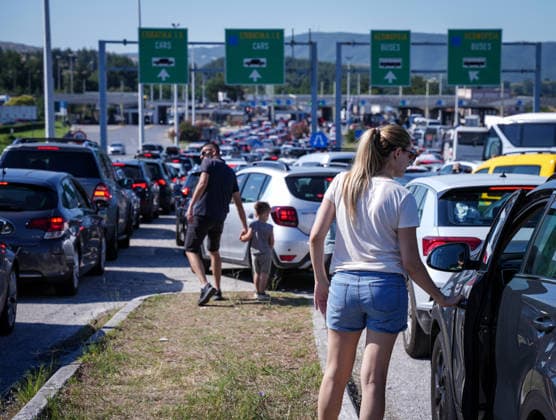 Schengen Entry Exit System North Macedonia and Greece border GEVGELIJA, NORTH MACEDONIA - JUNE 20: A view of the kilometer-long queues of vehicles heading toward Greece at the Evzoni border crossing in Gevgelija, North Macedonia on June 20, 2026. Travelers face hours-long delays amid heavy summer traffic and the implementation of the new Schengen Entry Exit System (EES), which requires the collection of biometric data from passengers. Nake Batev Anadolu Gevgelija North Macedonia. Editorial use only. Please get in touch for any other usage.  Copyright: x2026xAnadoluxNakexBatevx