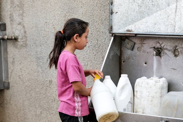 Displaced Palestinians collect water in al-Bureij refugee camp Displaced Palestinians gather to collect water from a distribution point in al-Bureij refugee camp in the central Gaza Strip on June 20, 2026. The water crisis has worsened following the shutdown of some desalination plants due to a shortage of diesel fuel needed for their operation, threatening water security for hundreds of thousands of residents who rely on desalinated water as their primary source of drinking water amid calls for urgent intervention to ensure fuel supplies and maintain the facilities operations. Photo by Moiz Salhi apaimages Nusairat Gaza Strip Palestinian Territory 200626_Bureij_MS_01(11) Copyright: xapaimagesxMoizxSalhixx xapaimagesx