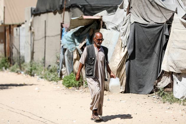 Displaced Palestinians collect water in al-Bureij refugee camp Displaced Palestinians gather to collect water from a distribution point in al-Bureij refugee camp in the central Gaza Strip on June 20, 2026. The water crisis has worsened following the shutdown of some desalination plants due to a shortage of diesel fuel needed for their operation, threatening water security for hundreds of thousands of residents who rely on desalinated water as their primary source of drinking water amid calls for urgent intervention to ensure fuel supplies and maintain the facilities operations. Photo by Moiz Salhi apaimages Nusairat Gaza Strip Palestinian Territory 200626_Bureij_MS_01(8) Copyright: xapaimagesxMoizxSalhixx xapaimagesx