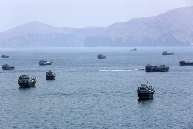 (260620) -- KHASAB, June 20, 2026 -- This photo taken on June 20, 2026 shows the Strait of Hormuz near Khasab, a small town in northern Oman. ) OMAN-KHASAB-STRAIT OF HORMUZ WenxXinnian 