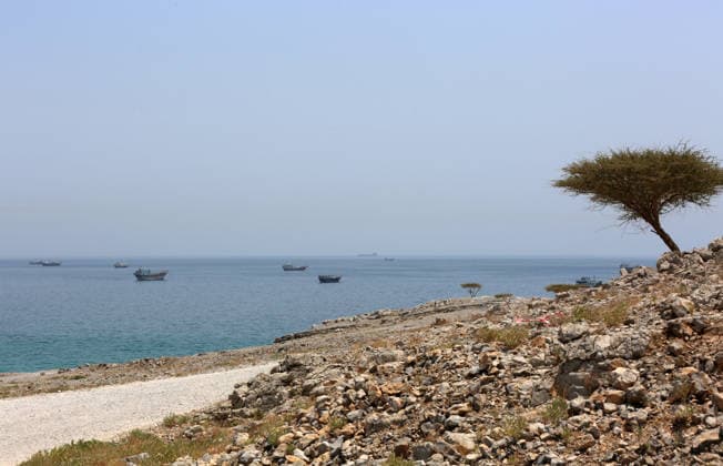 (260620) -- KHASAB, June 20, 2026 -- This photo taken on June 20, 2026 shows the Strait of Hormuz near Khasab, a small town in northern Oman. ) OMAN-KHASAB-STRAIT OF HORMUZ WenxXinnian 