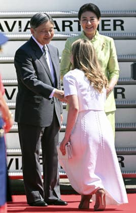 Japan s imperial couple arrive in Belgium Japan s Emperor Naruhito and Empress Masako are greeted by Belgium s Crown Princess Elisabeth (bottom) upon arriving at Melsbroek Air Base near Brussels on June 20, 2026, on the second leg of their official trip to the Netherlands and Belgium. (Pool photo)  A14AA0005619552P
