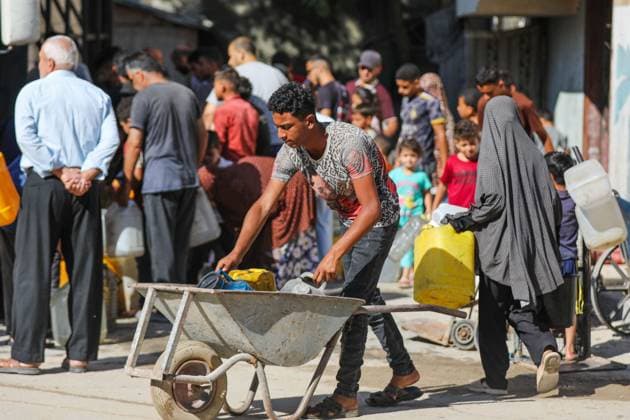 Residents Struggle to Access Drinking Water in Nuseirat Camp NUSEIRAT REFUGEE CAMP, CENTRAL GAZA STRIP JUNE 2026: Residents of Nuseirat refugee camp face increasing difficulties in obtaining drinking water and municipal water supplies amid ongoing shortages. Families dig makeshift pits in an effort to collect limited amounts of water to meet their daily needs. The scarcity of water continues to affect thousands of residents across the camp. NUSEIRAT, GAZA STRIP Palestine, State of Copyright: x xRamzixAbuxAmerx xJNAxPressx