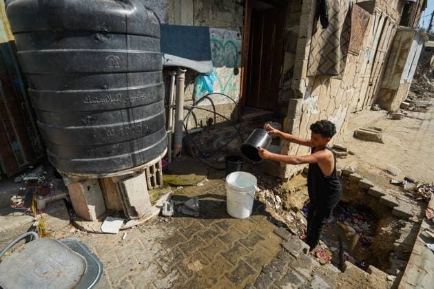 Residents Struggle to Access Drinking Water in Nuseirat Camp NUSEIRAT REFUGEE CAMP, CENTRAL GAZA STRIP JUNE 2026: Residents of Nuseirat refugee camp face increasing difficulties in obtaining drinking water and municipal water supplies amid ongoing shortages. Families dig makeshift pits in an effort to collect limited amounts of water to meet their daily needs. The scarcity of water continues to affect thousands of residents across the camp. NUSEIRAT, GAZA STRIP Palestine, State of Copyright: x xRamzixAbuxAmerx xJNAxPressx