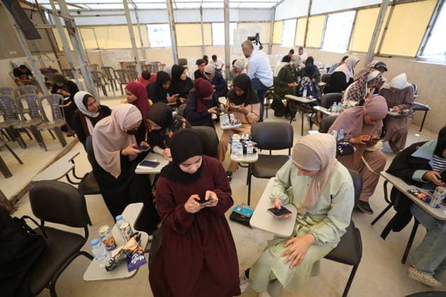 Palestinian Students Sit for Tawjihi Exams in Gaza Palestinian students sit for the General Secondary Education Certificate Examination (Tawjihi) at an examination hall in the Gaza Strip, on June 20, 2026. Thousands of students across the Gaza Strip are taking the nationwide exams despite the ongoing humanitarian crisis, power shortages and difficult educational conditions. Hassan Jedi apaimages Nusairat Gaza Strip Palestinian Territory 200626_Nusairat_HJ_00(29).jpeg Copyright: xapaimagesxHassanxJedix xapaimagesx