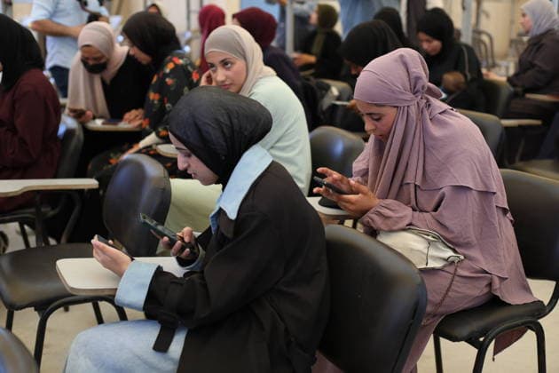 Palestinian Students Sit for Tawjihi Exams in Gaza Palestinian students sit for the General Secondary Education Certificate Examination (Tawjihi) at an examination hall in the Gaza Strip, on June 20, 2026. Thousands of students across the Gaza Strip are taking the nationwide exams despite the ongoing humanitarian crisis, power shortages and difficult educational conditions. Hassan Jedi apaimages Nusairat Gaza Strip Palestinian Territory 200626_Nusairat_HJ_00(11).jpeg Copyright: xapaimagesxHassanxJedix xapaimagesx