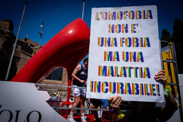 June 20, 2026, Rome, Rm, Italy: Tens of thousands of people take part in the 32nd edition of the Pride Parade in the streets of Rome. Homophobia is not a phobia but an incurable disease reads the sign. Rome Italy - ZUMAg256 20260620_znp_g256_039 Copyright: xMarcoxDixGianvitox