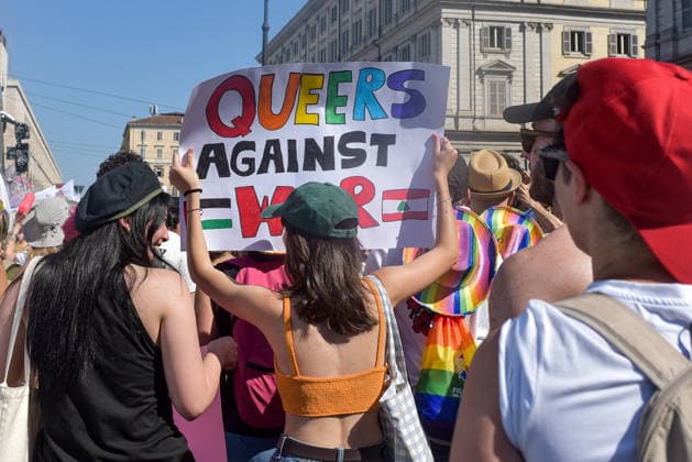June 20, 2026, Rome, Rome, Italy: A participant holds a sign during the Roma Pride parade in Rome on June 20, 2026. Rome Italy - ZUMAn299 20260620_zip_n299_032 Copyright: xVincenzoxNuzzolesex