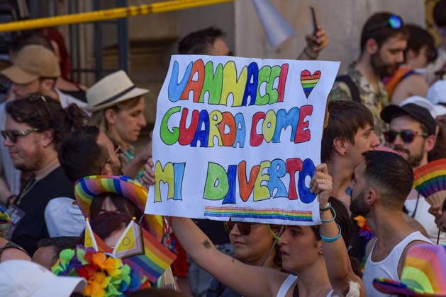 June 20, 2026, Rome, Rome, Italy: A participant holds a sign during the Roma Pride parade in Rome on June 20, 2026. Rome Italy - ZUMAn299 20260620_zip_n299_034 Copyright: xVincenzoxNuzzolesex