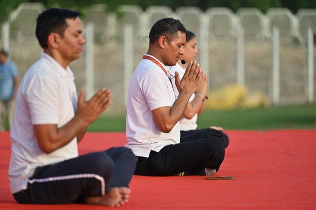 GURUGRAM, INDIA - JUNE 20: People perform yoga during the Yoga Protocol rehearsal ahead of the 12th International Day of Yoga at Tau Devi Lal Stadium, sector-38 near Rajiv Chowk, on June 20, 2026 in Gurugram, India. (Photo by Parveen Kumar Hindustan Times ) Yoga Protocol Rehearsal Ahead Of 12th International Day Of Yoga At Tau Devi Lal Stadium