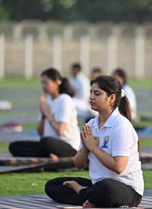 GURUGRAM, INDIA - JUNE 20: People perform yoga during the Yoga Protocol rehearsal ahead of the 12th International Day of Yoga at Tau Devi Lal Stadium, sector-38 near Rajiv Chowk, on June 20, 2026 in Gurugram, India. (Photo by Parveen Kumar Hindustan Times ) Yoga Protocol Rehearsal Ahead Of 12th International Day Of Yoga At Tau Devi Lal Stadium