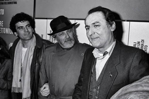 Massimo Troisi ROME, ITALY - DECEMBER 2: The actor and director Massimo Troisi with philosopher, writer Luciano De Crescenzo, showman Renzo Arbore, during meets the students in the main lecture theatre at La Sapienza University on December 2, 1982 in Rome, Italy. Rome Lazio Italy Copyright: xStefanoxMontesix