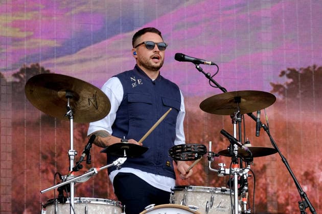 June 20, 2026, Newport, United Kingdom: Scottish drummer Alan Jukes performing live on stage with The Saint PHNX Band at the Isle of Wight festival. He first gained fame in 2020 by posting videos of himself singing sea shanties on TikTok. In 2021, he released a version of the folk song Wellerman which peaked at the top of the UK Singles Chart. The Saint PHNX Band is currently Nathan Evans Lead vocals and acoustic guitar., Stevie Jukes Lead vocals, guitar, and bass, Alan Jukes Backing vocals, drums, and percussion Newport United Kingdom - ZUMAs197 20260620_aaa_s197_173 Copyright: xDawnxFletcher-Parkx