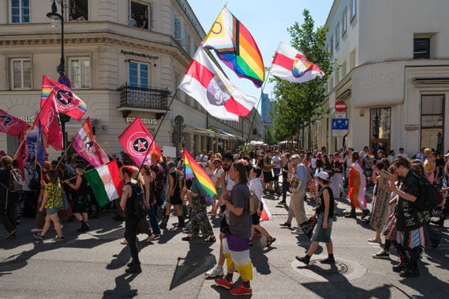June 20, 2026, Warsaw, Masovian Voivodeship, Poland: People carry rainbow, socialist, and various national flags as hundreds march in Warsaw s first ever radical Pride parade. Called Equality Parade - Queer Liberation March in Polish, the grassroots march was organized by a collective of radical LGBTQ+ activists as an anti-capitalist alternative to Warsaw s traditional Pride parade, which has recently become dominated by corporate sponsors. Warsaw Poland - ZUMAk204 20260620_zip_k204_012 Copyright: xRomanxKozielx