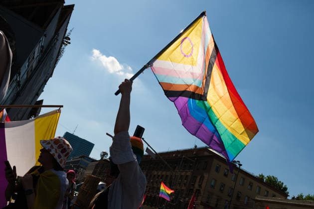 June 20, 2026, Warsaw, Masovian Voivodeship, Poland: A person holds up a rainbow intersex inclusive progress pride flag during Warsaw s first ever radical Pride parade. Called Equality Parade - Queer Liberation March in Polish, the grassroots march was organized by a collective of radical LGBTQ+ activists as an anti-capitalist alternative to Warsaw s traditional Pride parade, which has recently become dominated by corporate sponsors. Warsaw Poland - ZUMAk204 20260620_zip_k204_016 Copyright: xRomanxKozielx
