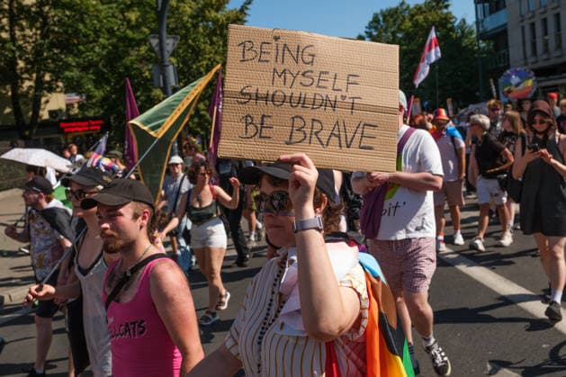 June 20, 2026, Warsaw, Masovian Voivodeship, Poland: A person carries a sign that reads being myself shouldn t be brave during Warsaw s first ever radical Pride parade. Called Equality Parade - Queer Liberation March in Polish, the grassroots march was organized by a collective of radical LGBTQ+ activists as an anti-capitalist alternative to Warsaw s traditional Pride parade, which has recently become dominated by corporate sponsors. Warsaw Poland - ZUMAk204 20260620_zip_k204_027 Copyright: xRomanxKozielx