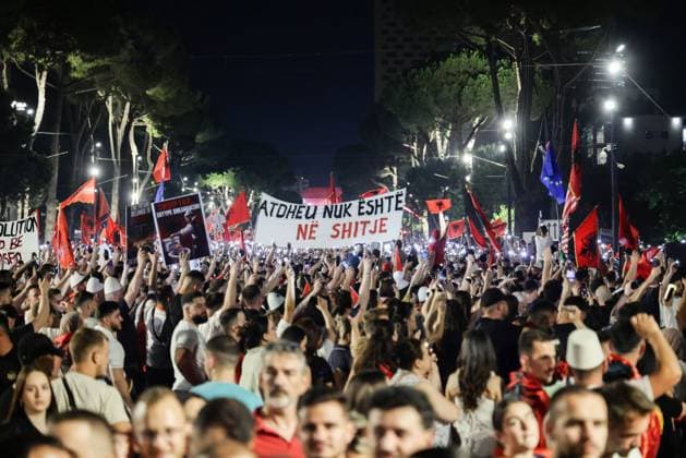 Thousands Gather in Tirana for Day 21 of Anti-Kushner Protests TIRANA, ALBANIA JUNE 20, 2026: Thousands of demonstrators gather in central Tirana during the twenty-first consecutive day of protests against a proposed luxury tourism development project linked to Jared Kushner. The rally drew one of the largest crowds since the movement began in late May, including members of the Albanian diaspora who traveled from across Europe and beyond to take part. Protesters marched through the capital carrying banners, placards, and Albanian flags while calling for the cancellation of the project and expressing concerns over its potential environmental impact on protected coastal areas. Tirana Albania Copyright: x xVlasovxSulajx xJNAxPressx