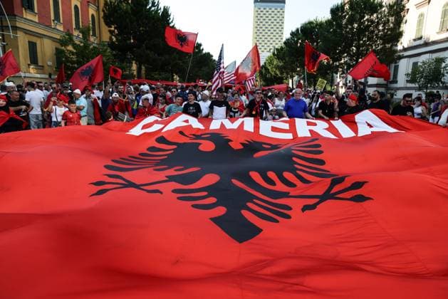Thousands Gather in Tirana for Day 21 of Anti-Kushner Protests TIRANA, ALBANIA JUNE 20, 2026: Thousands of demonstrators gather in central Tirana during the twenty-first consecutive day of protests against a proposed luxury tourism development project linked to Jared Kushner. The rally drew one of the largest crowds since the movement began in late May, including members of the Albanian diaspora who traveled from across Europe and beyond to take part. Protesters marched through the capital carrying banners, placards, and Albanian flags while calling for the cancellation of the project and expressing concerns over its potential environmental impact on protected coastal areas. Tirana Albania Copyright: x xVlasovxSulajx xJNAxPressx