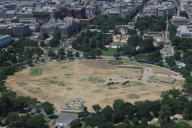 WASHINGTON, D.C. - JUNE 20: Workers clean the DC Ellipse lawn after the UFC Freedom 250 event on June 20, 2026 in Washington D.C. Copyright: xmpi34x
