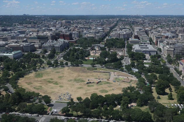 WASHINGTON, D.C. - JUNE 20: Workers clean the DC Ellipse lawn after the UFC Freedom 250 event on June 20, 2026 in Washington D.C. Copyright: xmpi34x