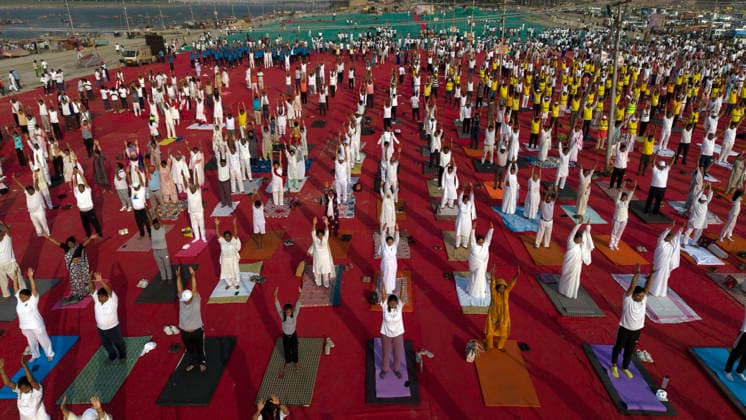 June 21, 2026, Prayagraj, Uttar Pradesh, India: Prayagraj: An aerial view of People take part in a Yoga session at Sangam on the occasion of 12th International Yoga Day, in Prayagraj on Sunday, June 21, 2026. Prayagraj India - ZUMAv115 20260621_zap_v115_006 Copyright: xPrabhatxKumarxVermax