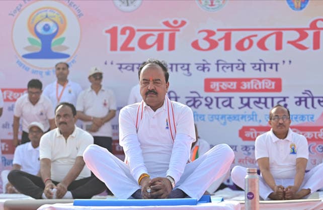 June 21, 2026, Prayagraj, Uttar Pradesh, India: Prayagraj: Uttar Pradesh Deputy chief minister Keshav Prasad Maurya take part in a Yoga session at Sangam on the occasion of 12th International Yoga Day, in Prayagraj on Sunday, June 21, 2026. Prayagraj India - ZUMAv115 20260621_zap_v115_028 Copyright: xPrabhatxKumarxVermax