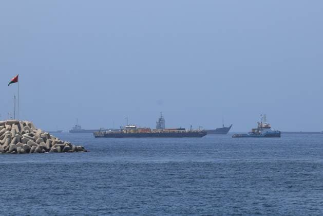 Commercial ships and oil tankers in Gulf of Oman ahead of Hormuz reopening MUSCAT, OMAN - JUNE 21: A view of commercial cargo vessels and crude oil tankers are anchored in the Gulf of Oman, off the coast of Muscat, Oman, on June 21, 2026, as they prepare to transit through the critical Strait of Hormuz. Maritime traffic along this vital global trade corridor experienced severe disruptions following heightened geopolitical tensions between the United States and Iran that escalated earlier in February. Following a diplomatic memorandum of understanding reached in mid-June, the strategic waterway is expected to fully reopen to international shipping and energy transit. Shady Alassar Anadolu Muscat Oman. Editorial use only. Please get in touc  Copyright: x2026xAnadoluxShadyxAlassarx