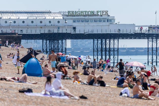June 21, 2026, Brighton, UK: London, UK. Sunseekers enjoy the warm sunshine on Brighton Beach, East Sussex today as weather forecasters predict another heatwave for the South of the country. The Met Office has issued Amber alerts for Ã¢â‚¬ËœExtreme HeatÃ¢â‚¬â ¢ today with highs of over 38c for London and the South East by Wednesday. Brighton UK  - ZUMAl94_ 20260621_zaf_l94_005 Copyright: xAlexxLentatix
