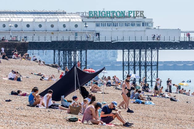 June 21, 2026, Brighton, UK: London, UK. Sunseekers enjoy the warm sunshine on Brighton Beach, East Sussex today as weather forecasters predict another heatwave for the South of the country. The Met Office has issued Amber alerts for Ã¢â‚¬ËœExtreme HeatÃ¢â‚¬â ¢ today with highs of over 38c for London and the South East by Wednesday. Brighton UK  - ZUMAl94_ 20260621_zaf_l94_001 Copyright: xAlexxLentatix