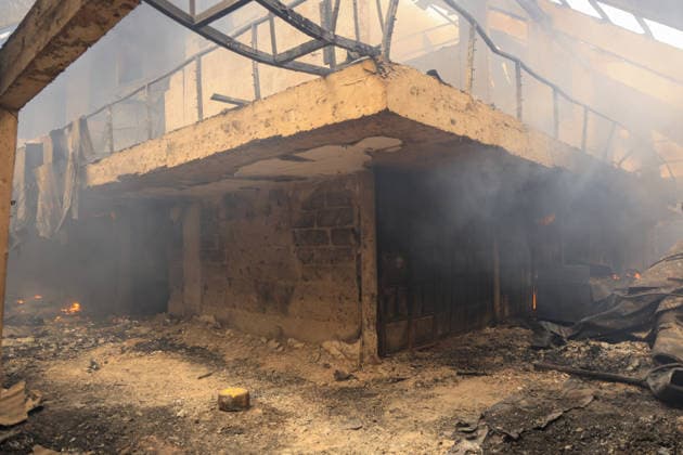 Blaze destroys shops at Nairobi s Gikomba Market NAIROBI, KENYA - JUNE 21: A view of burning stucture as people inspect the damage and try to salvage their belongings after a fire broke out at Gikomba Market in Nairobi, Kenya, on June 21, 2026. Numerous shops were destroyed in the blaze as firefighters worked to contain the fire. Lucas Mukasa Anadolu Nairobi Kenya. Editorial use only. Please get in touch for any other usage.  Copyright: x2026xAnadoluxLucasxMukasax