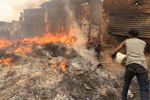 Blaze destroys shops at Nairobi s Gikomba Market NAIROBI, KENYA - JUNE 21: People inspect the damage and try to salvage their belongings after a fire broke out at Gikomba Market in Nairobi, Kenya, on June 21, 2026. Numerous shops were destroyed in the blaze as firefighters worked to contain the fire. Lucas Mukasa Anadolu Nairobi Kenya. Editorial use only. Please get in touch for any other usage.  Copyright: x2026xAnadoluxLucasxMukasax