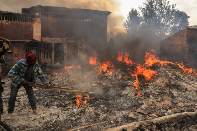 Blaze destroys shops at Nairobi s Gikomba Market NAIROBI, KENYA - JUNE 21: People inspect the damage and try to salvage their belongings after a fire broke out at Gikomba Market in Nairobi, Kenya, on June 21, 2026. Numerous shops were destroyed in the blaze as firefighters worked to contain the fire. Lucas Mukasa Anadolu Nairobi Kenya. Editorial use only. Please get in touch for any other usage.  Copyright: x2026xAnadoluxLucasxMukasax