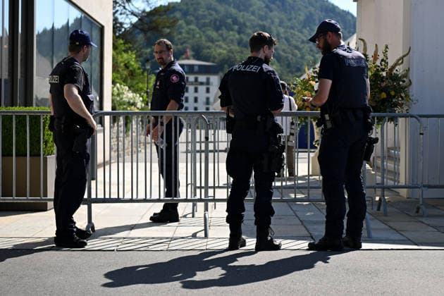 (260621) -- BUERGENSTOCK, June 21, 2026 -- Police officers stand guard in Buergenstock near Lucerne, Switzerland, June 21, 2026. Technical-level talks between the United States and Iran under the Islamabad Memorandum of Understanding (MoU) is held here on Sunday. ) SWITZERLAND-BUERGENSTOCK-U.S.-IRAN TALKS LianxYi 