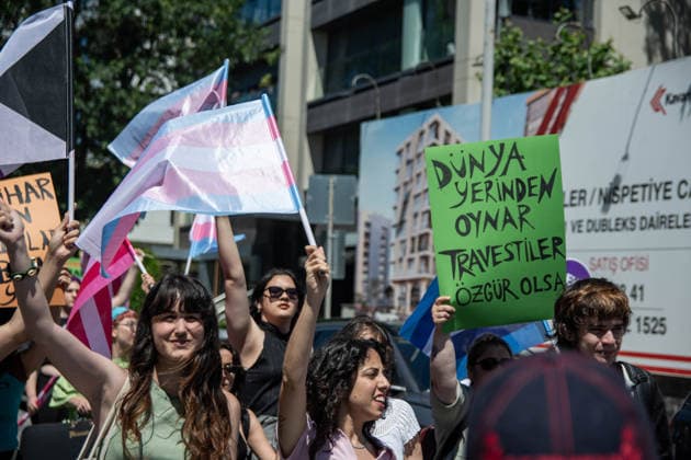 June 21, 2026, Istanbul, Istanbul, Turkey: Activists participate in the 12th Trans Pride March in the Kadikoy district of Istanbul, Turkey, on June 21, 2026. Following the conclusion of the march and after participants had dispersed, police detained several people, including journalists covering the event. The annual march was organized to raise awareness of transgender rights and issues affecting the LGBTQ+ community. Istanbul Turkey - ZUMAt171 20260621_zip_t171_011 Copyright: xAbdullahxTepelix
