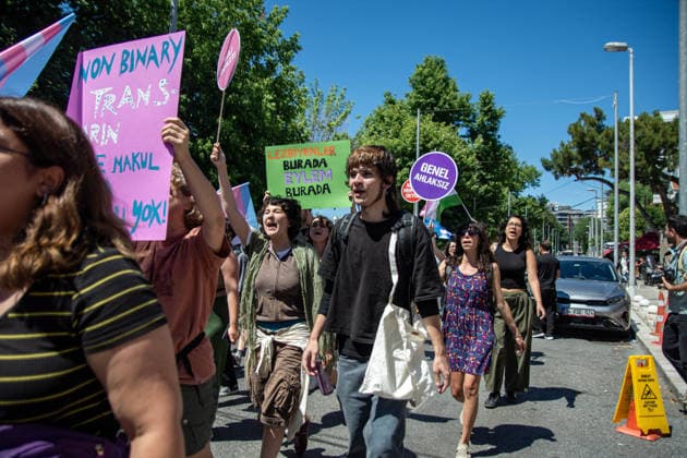 June 21, 2026, Istanbul, Istanbul, Turkey: Activists participate in the 12th Trans Pride March in the Kadikoy district of Istanbul, Turkey, on June 21, 2026. Following the conclusion of the march and after participants had dispersed, police detained several people, including journalists covering the event. The annual march was organized to raise awareness of transgender rights and issues affecting the LGBTQ+ community. Istanbul Turkey  - ZUMAt171 20260621_zip_t171_014 Copyright: xAbdullahxTepelix