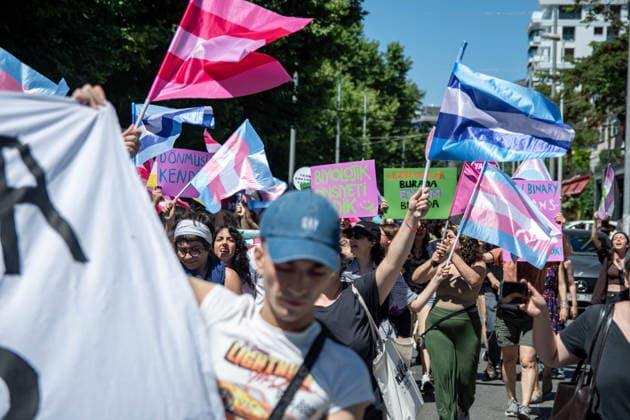 June 21, 2026, Istanbul, Istanbul, Turkey: Activists participate in the 12th Trans Pride March in the Kadikoy district of Istanbul, Turkey, on June 21, 2026. Following the conclusion of the march and after participants had dispersed, police detained several people, including journalists covering the event. The annual march was organized to raise awareness of transgender rights and issues affecting the LGBTQ+ community. Istanbul Turkey  - ZUMAt171 20260621_zip_t171_031 Copyright: xAbdullahxTepelix
