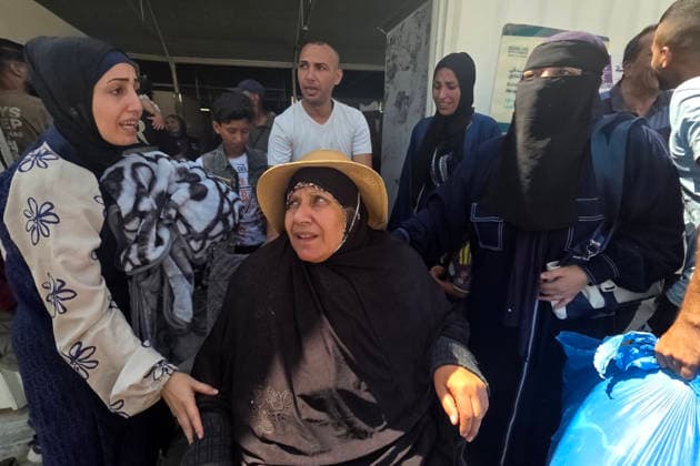 Families welcome returning patients at Nasser Medical Complex Palestinians welcome their relatives upon their arrival at Nasser Medical Complex in Khan Younis, southern Gaza Strip, on June 21, 2026, after they completed medical treatment in hospitals in the West Bank and Jerusalem. Photo by Tariq Mohammad APA Images Khan Yunis Gaza Strip Palestinian Territory 210626_Khan_Yunis_TM_03(5) Copyright: xapaimagesxTariqxMohammad xapaimagesx