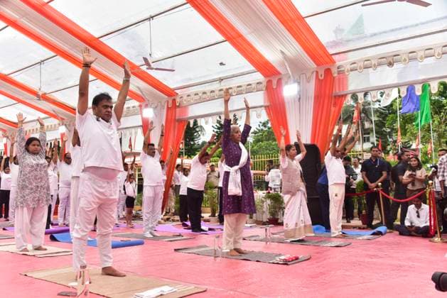 June 21, 2026, Guwahati, Assam, India: Union Finance Minister Nirmala Sitharaman, Assam Chief Minister Himanta Bishwa Sarma, and others participate in a mass yoga session organized on the occasion of International Day of Yoga in Guwahati, India, on June 21, 2026. The International Day of Yoga is a global observance celebrated annually on June 21 to promote the benefits of yoga for physical, mental, and spiritual well-being. Guwahati India - ZUMAa254 20260621_zip_a254_050 Copyright: xHafizxAhmedx