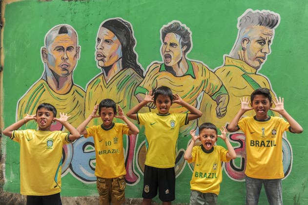 FIFA WORLD CUP 2026 - Brazil Goli (Corridor) in Chattogram, Bangladesh. Chattogram, Bangladesh - Local children, passionate supporters of Brazil s national football team, pose in front of a vibrant mural featuring Brazilian football stars in Brazil Goli (Corridor) at Bahaddarhat Khatib Para. The narrow alley, decorated with Brazilian flags, colors, and football-themed artwork, has become a unique gathering place for football enthusiasts and a symbol of Bangladesh s enduring love for Brazilian football, especially during major international tournaments., Credit:Md Rafayat Haque Khan Mohammed Rafayat Haque Khan Avalon Bangladesh, Chattogram  Copyright: xMdxRafayatxHaquexKhanx xMohammedxRafayatxHaquexKhanx xAvalonx 1111628837