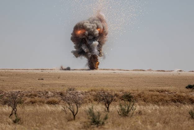 Syrian bomb disposal teams detonate YPG landmines near Ayn Issa RAQQA, SYRIA - JUNE 21: Smoke and flames rise from the area of the controlled explosion operated by bomb disposal teams affiliated with the Syrian Ministry of Defense, detonating landmines left behind by the YPG around the Ayn Issa district north of Raqqa, Syria on June 21, 2026. Abdulrhman El Ali Anadolu Raqqa Syria. Editorial use only. Please get in touch for any other usage.  Copyright: x2026xAnadoluxAbdulrhmanxElxAlix