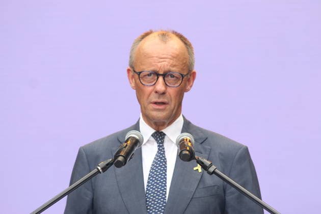 Bundeskanzler Friedrich Merz (CDU) spricht bei der Festveranstaltung zum 2. Nationalen Veteranentag. Deutschland feiert den 2. Nationalen Veteranentag mit einer großen Festveranstaltung rund um das Reichstagsgebäude.. Berlin, 21.06.2026 *** Chancellor Friedrich Merz of the CDU speaks at the ceremony marking the 2nd National Veterans Day. Germany celebrates the 2nd National Veterans Day with a large ceremony around the Reichstag building in Berlin, June 21, 2026,detected_source_language Copyright: xAgenturxMatthiasxWehnertx xM.xGränzdörferx