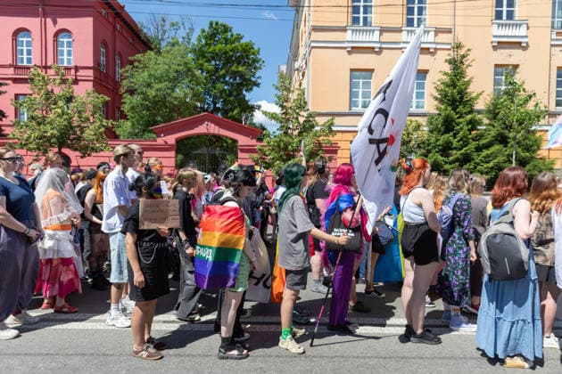 June 21, 2026, Kyiv, Ukraine: Participants seen marching to demand the adoption of civil partnership legislation and to oppose discrimination and specific provisions within the new Civil Code. The Equality March for LGBTQ+ rights is taking place. Participants are calling for the adoption of a law on civil partnerships while opposing the draft of the new Civil Code and manifestations of discrimination. The key goal of the rally is the legal recognition of same sex relationships which would secure rights regarding shared property, medical decision making, and social protection. Under the slogan Our families are part of Ukraine, participants are also demanding stronger accountability for hate crimes. Despite a parallel rally held by suppor  - ZUMAs197 20260621_aaa_s197_089 Copyright: xMykhayloxPalinchakx