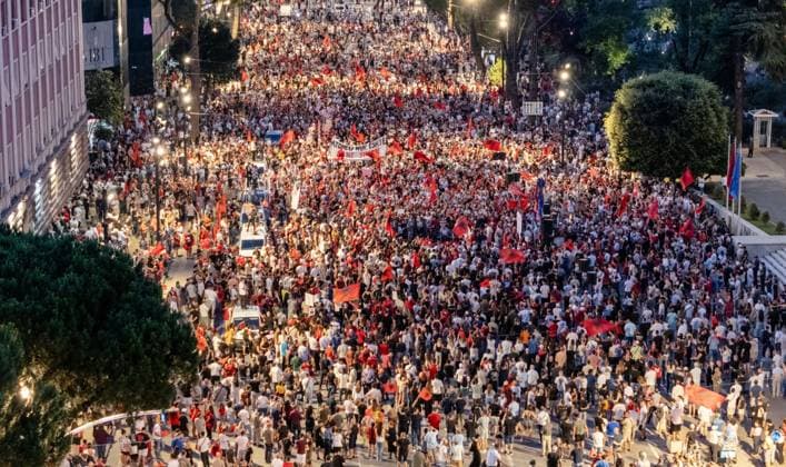 Tirana Protest Enters Day 22 TIRANA, ALBANIA JUNE 21, 2026: Demonstrators gather in central Tirana during the twenty-second consecutive day of protests against a proposed luxury tourism development project linked to Jared Kushner. Participants marched through the capital carrying banners, placards, and Albanian flags while calling for the cancellation of the project and greater protection of Albania™s coastal environment. After three weeks of daily demonstrations, the movement has continued to draw support from environmental activists, civil society groups, students, and families. Tirana Albania Copyright: x xVlasovxSulajx xJNAxPressx