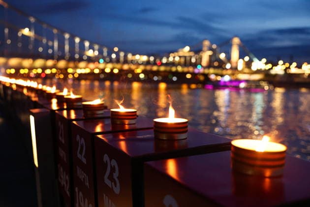 RUSSIA, MOSCOW - JUNE 21, 2026: Lit candles are seen during an event titled Line of Remembrance at Krymskaya Naberezhnaya Street. Attendees lit 1418 candles to commemorate every day of the Great Patriotic War (the Eastern Front of WWII). Sergei Bulkin TASS  94117070
