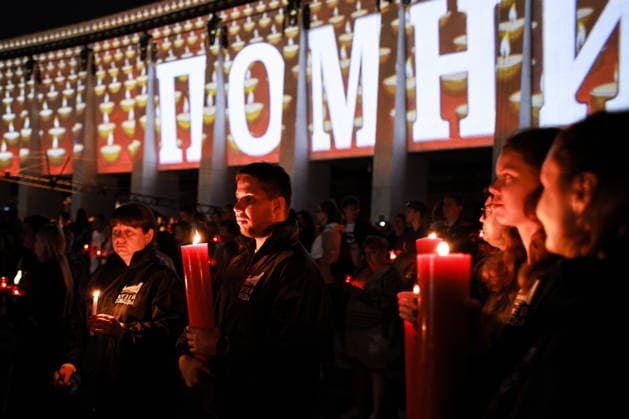 RUSSIA, MOSCOW - JUNE 21, 2026: People take part in an event titled Candle of Remembrance at Victory Museum. The event commemorates the 85th anniversary of Nazi Germany s invasion of the Soviet Union in WWII. Mikhail Tereshchenko TASS  94122011