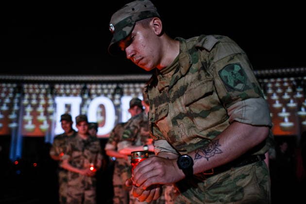 RUSSIA, MOSCOW - JUNE 21, 2026: People take part in an event titled Candle of Remembrance at Victory Museum. The event commemorates the 85th anniversary of Nazi Germany s invasion of the Soviet Union in WWII. Mikhail Tereshchenko TASS  94122029